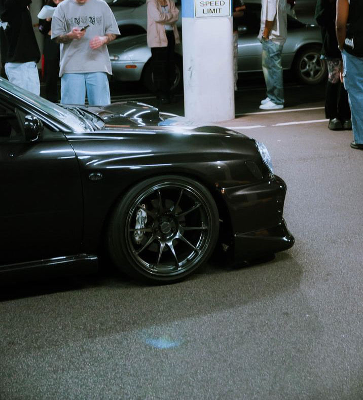Subaru black wrx at car meet 