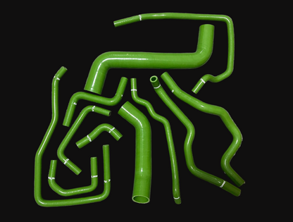 Green silicone hose kit on a black background