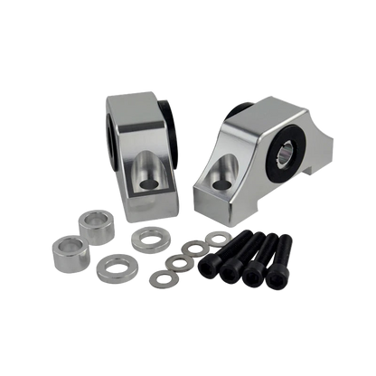 Metal mechanical components including two main parts and small parts on a white background